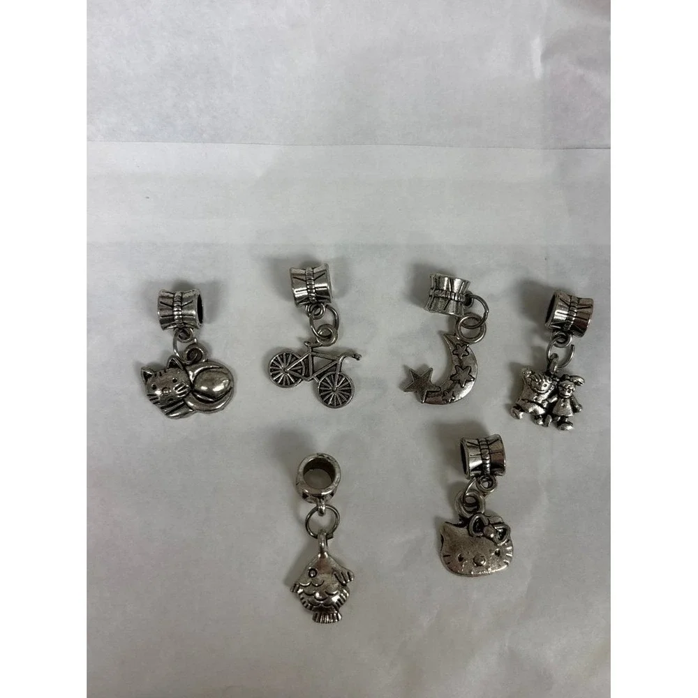 6 silver colored charms for‎ charm bracelet